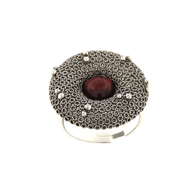 Silver filigree ring with garnet