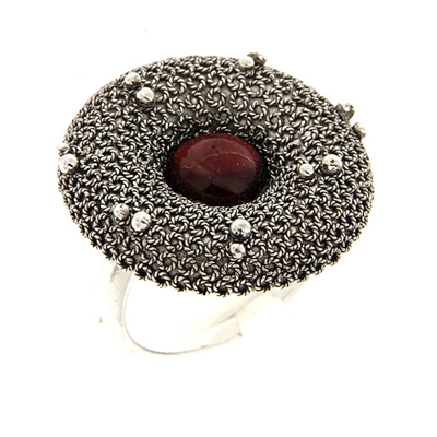 Silver filigree ring with garnet