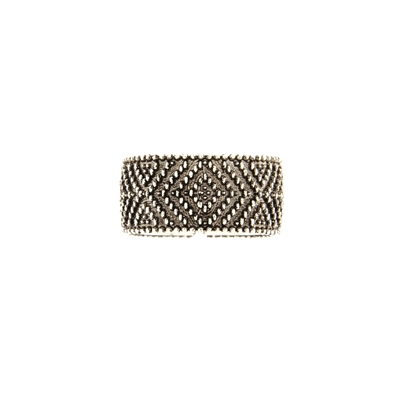 Silver filigree band ring.