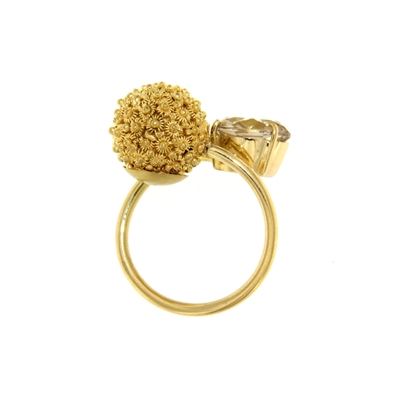 Gold contrarié ring with imperial topaz and honycomb filigree sphere