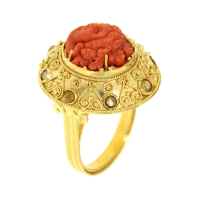Gold ring with coral and diamonds