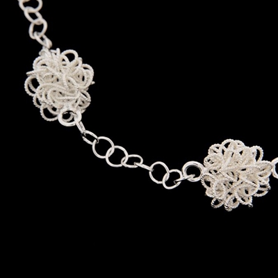 Silver  bracelet with filigree flocks