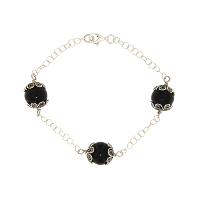 Bracciale con tre Su coccu e catena rolò