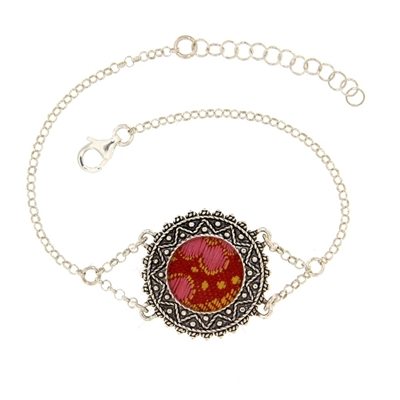 Silver filigree bracelet with red brocade