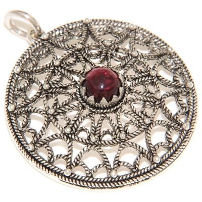 Silver filigree pendant with garnet