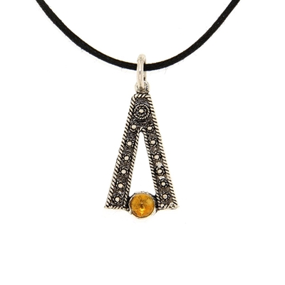 Silver pendant with filigree decoration and citrine quartz