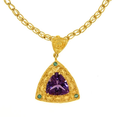 Gold pendant with amethyst and emeralds