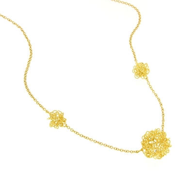 Gold necklace with filigree flocks