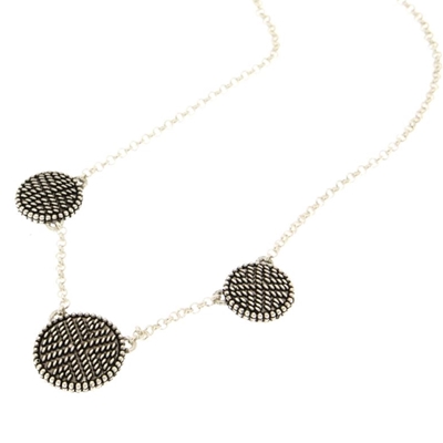 Silver necklace with three Pibiones discs