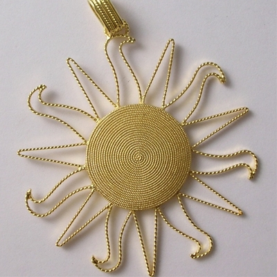 Ciondolo sole in filigrana