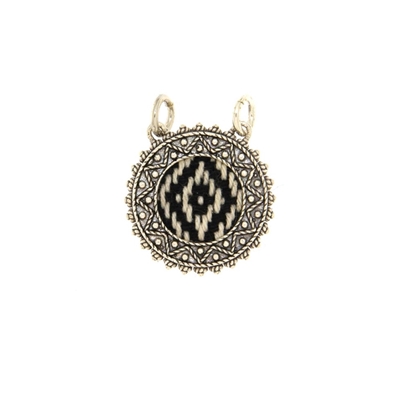 Silver  filigree pendant  with coarse wollen