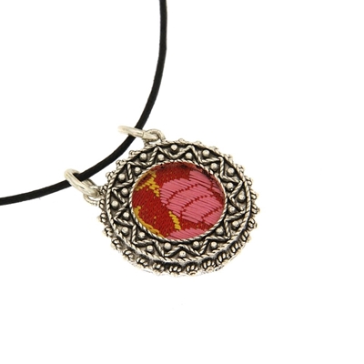 Silver  filigree pendant with red brocade