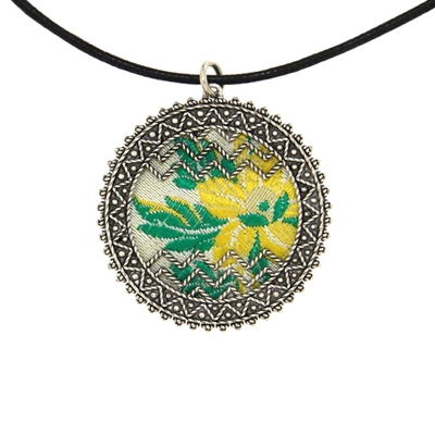 Silver filigree pendant with white brocade