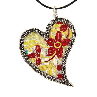 Silver heart pendant with white brocade