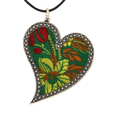 Silver heart pendant with green brocade