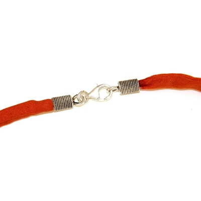 Girocollo in seta arancione con terminali Spirali