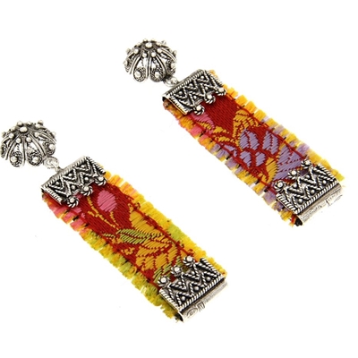Silver filigree earrings with red brocade
