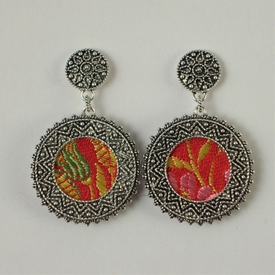 Silver filigree earrings with red brocade