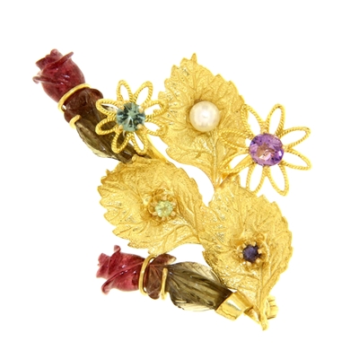 Gold brooch with precious stones